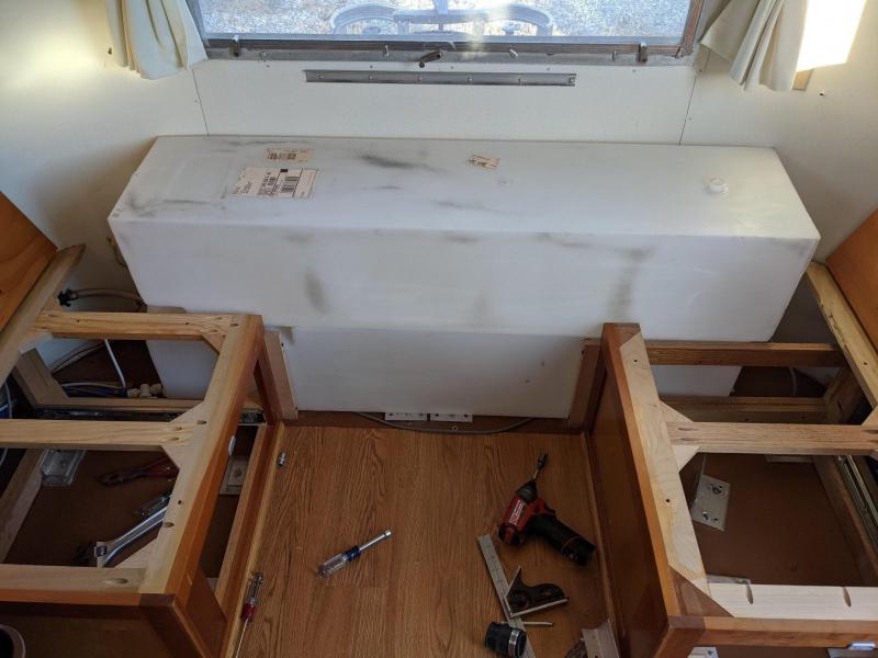 The shower tank in its framed surround.