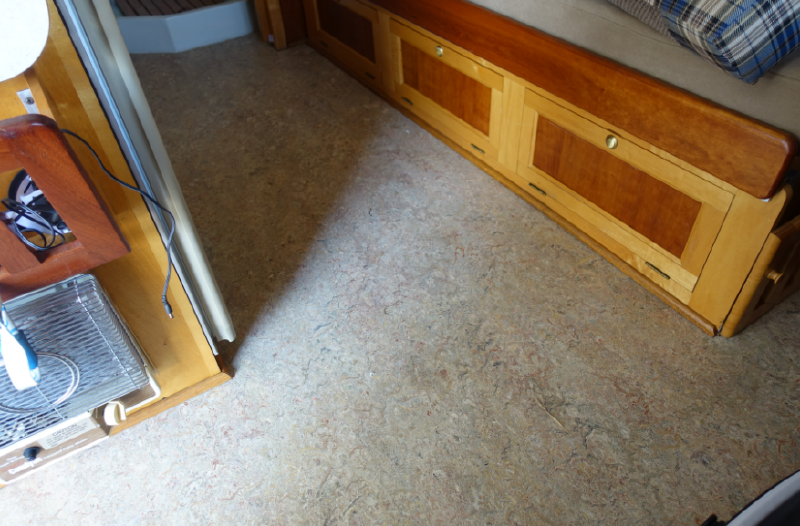 New Marmoleum, run right up to the shower pan.