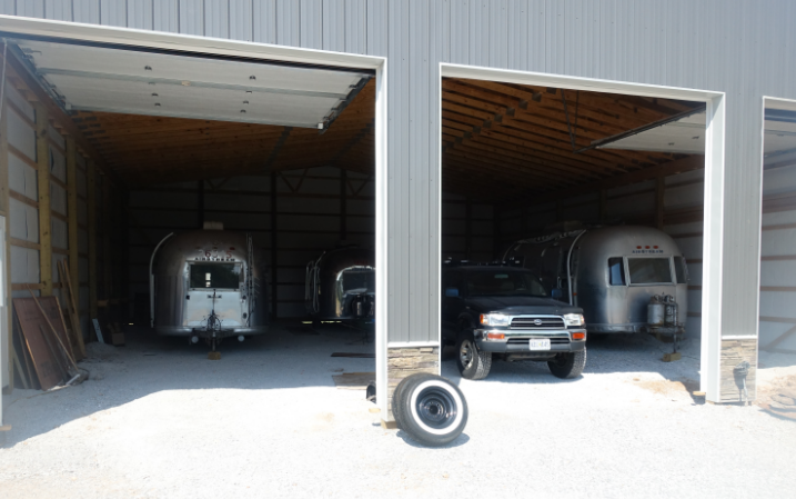 Three Airstreams in the new barn.