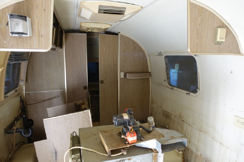 Gutted toward the front; the galley removed.