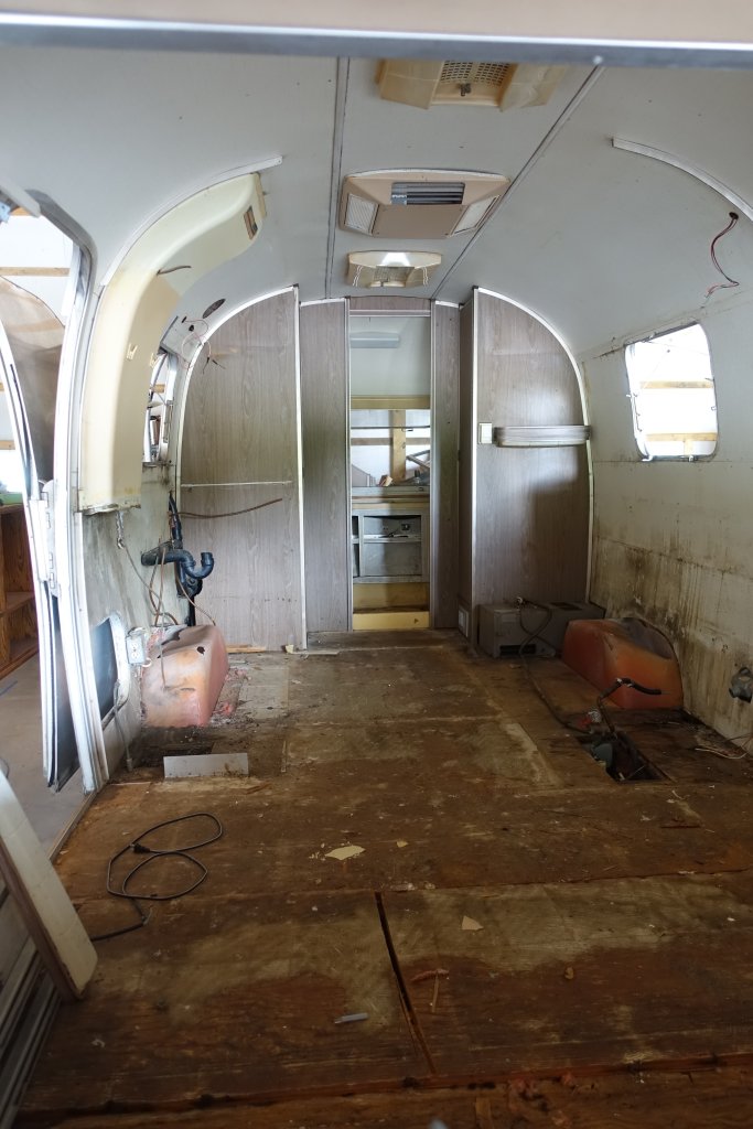 Stripped back to the closets, which are in good condition and will be kept.