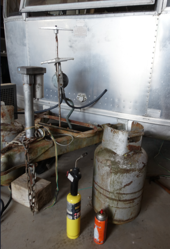 The frozen propane hold-down, freed with a MAPP torch, Kroil and pipe levers.