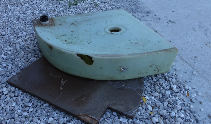 The black tank, removed.